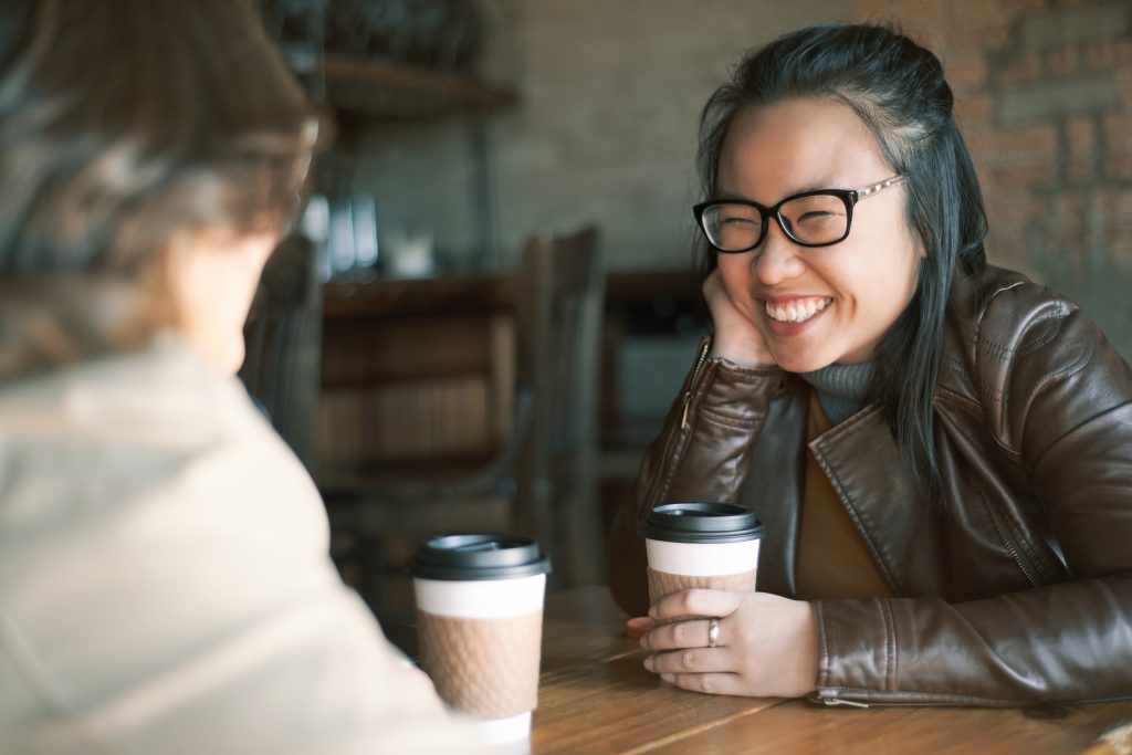 Friends talking over coffee